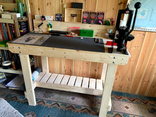 Craft wooden workbench with half depth shelf to sit at