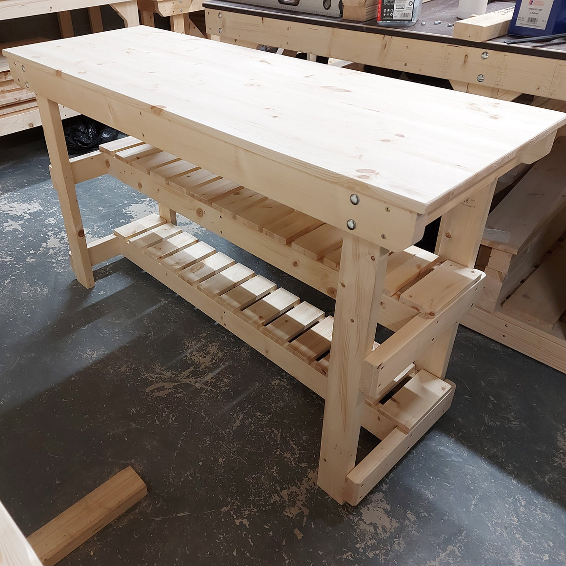 wooden workbench with recessed shelf